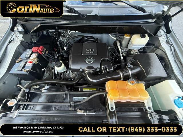 Photo of 2016 Brilliant Silver Metallic Nissan NV Passenger NV3500 HD