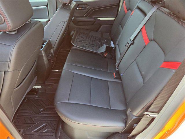 Photo of 2025 Sunrise Orange Chevrolet Colorado