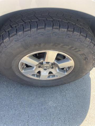 Photo of 2010 Radiant Silver Nissan Frontier