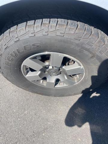 Photo of 2010 Radiant Silver Nissan Frontier