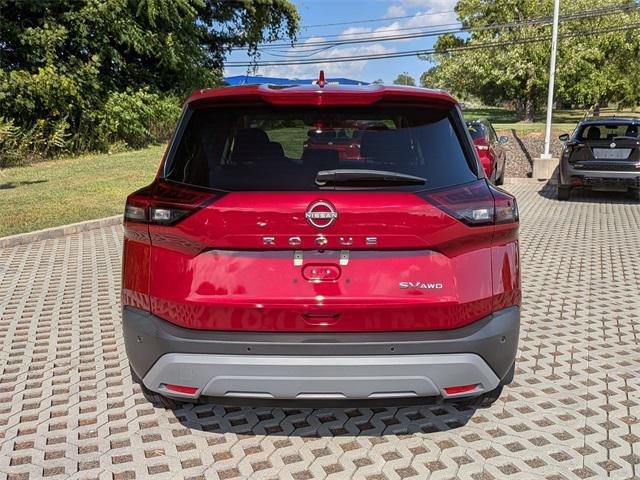 Photo of 2023 Scarlet Ember Tintcoat Nissan Rogue