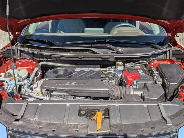 Photo of 2023 Scarlet Ember Tintcoat Nissan Rogue