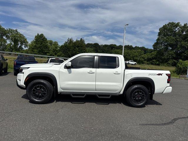 Photo of 2022 Glacier White Nissan Frontier