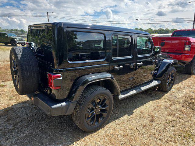 Photo of 2021 Black Clearcoat Jeep Wrangler Unlimited 4xe