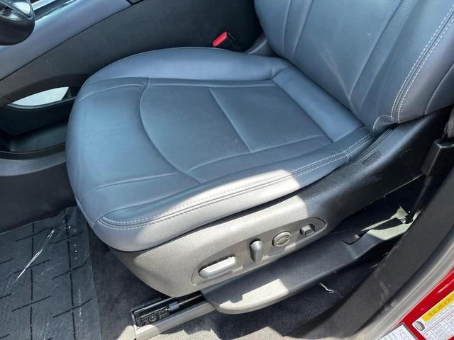 Photo of 2024 Cherry Red Tintcoat Buick Enclave