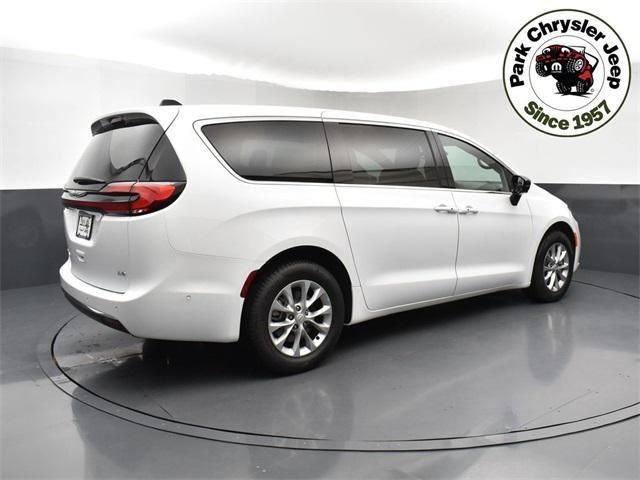 Photo of 2025 Bright White Clearcoat Chrysler Pacifica