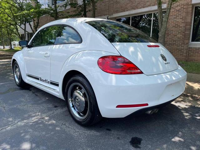 Photo of 2013 Candy White Volkswagen Beetle