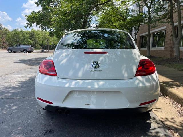 Photo of 2013 Candy White Volkswagen Beetle
