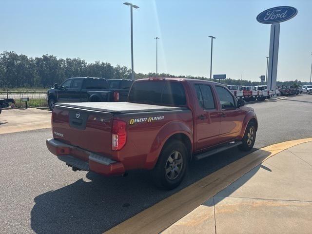 Photo of 2013 Lava Red Nissan Frontier