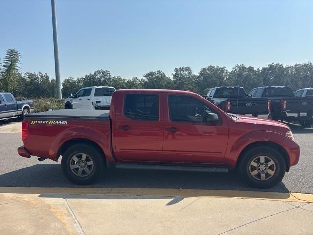 Photo of 2013 Lava Red Nissan Frontier