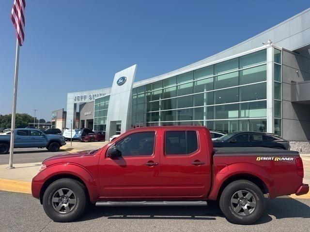 Photo of 2013 Lava Red Nissan Frontier