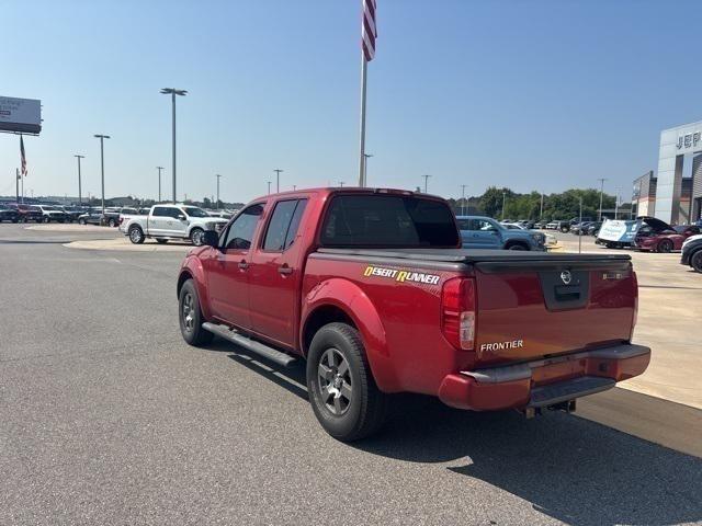 Photo of 2013 Lava Red Nissan Frontier