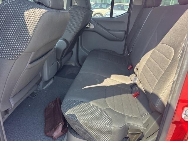 Photo of 2013 Lava Red Nissan Frontier