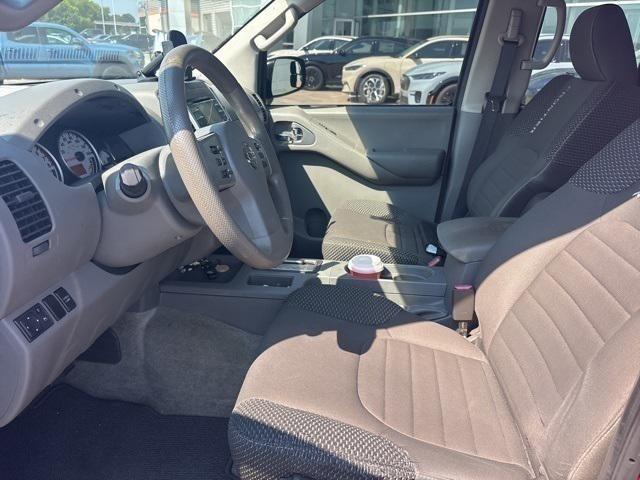 Photo of 2013 Lava Red Nissan Frontier