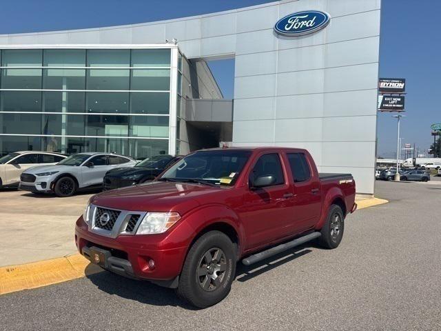 Photo of 2013 Lava Red Nissan Frontier