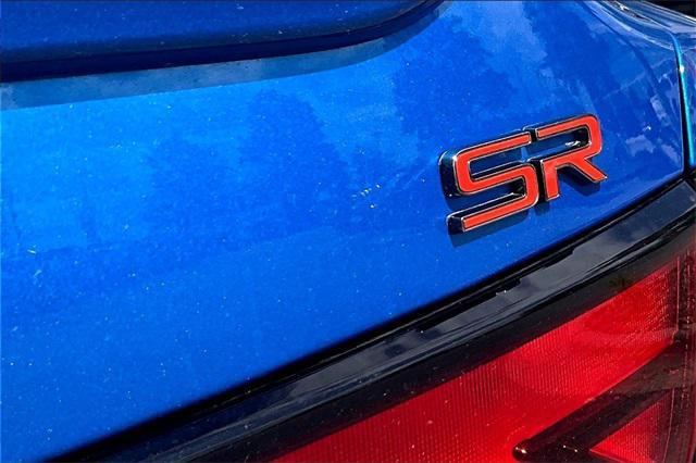 Photo of 2024 Electric Blue Metallic/Super Black Nissan Sentra