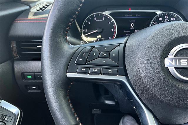 Photo of 2024 Electric Blue Metallic/Super Black Nissan Sentra