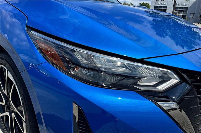 Photo of 2024 Electric Blue Metallic/Super Black Nissan Sentra