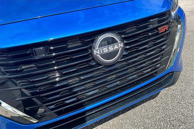 Photo of 2024 Electric Blue Metallic/Super Black Nissan Sentra
