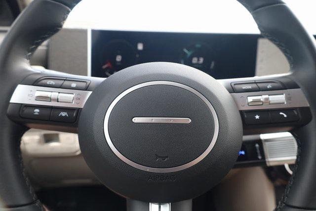 Photo of 2025 Deep Sea Hyundai TUCSON Hybrid