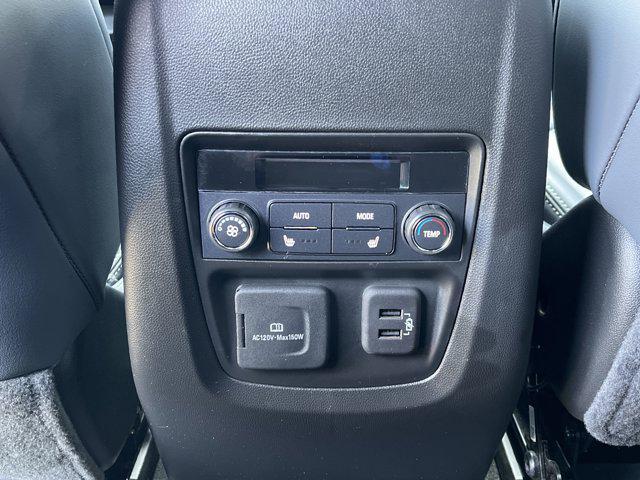 Photo of 2023 Sage Metallic Buick Enclave