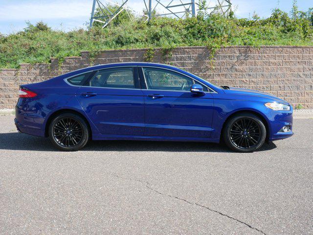 Photo of 2015 Deep Impact Blue Ford Fusion