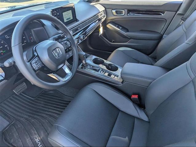 Photo of 2026 Blue Lagoon Honda Civic Hybrid