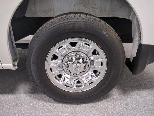 Photo of 2016 Glacier White Nissan NV Passenger NV3500 HD