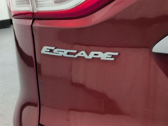 Photo of 2014 SUNSET METALLIC Ford Escape