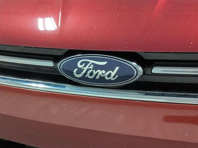 Photo of 2014 SUNSET METALLIC Ford Escape