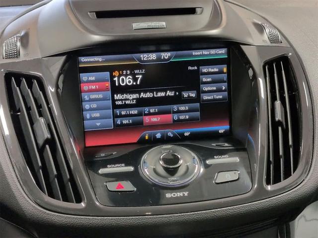 Photo of 2014 SUNSET METALLIC Ford Escape