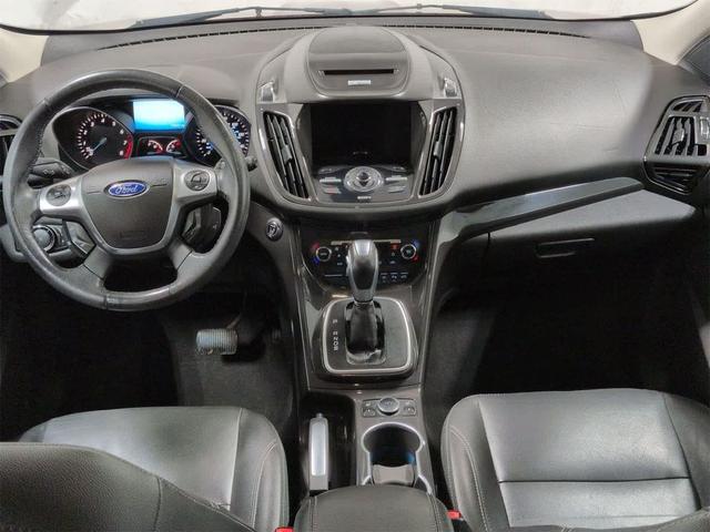 Photo of 2014 SUNSET METALLIC Ford Escape