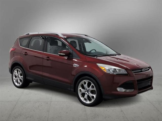 Photo of 2014 SUNSET METALLIC Ford Escape