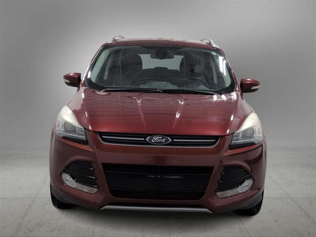Photo of 2014 SUNSET METALLIC Ford Escape