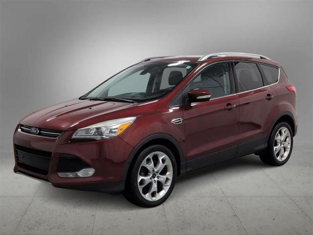 Photo of 2014 SUNSET METALLIC Ford Escape