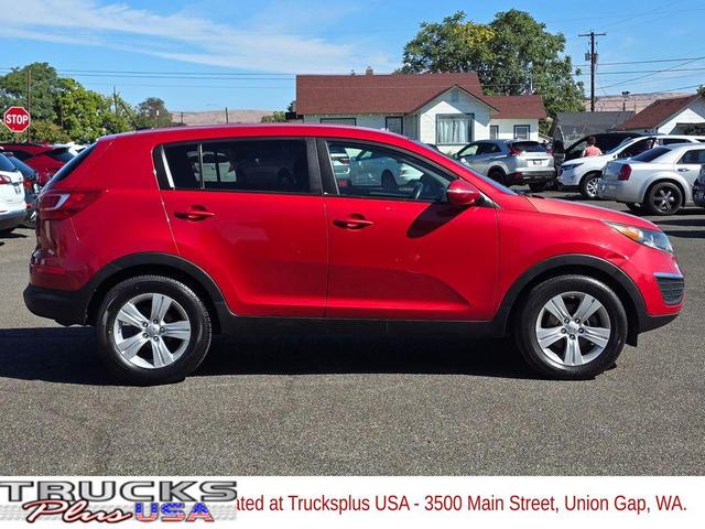 Photo of 2013 Signal Red Kia Sportage