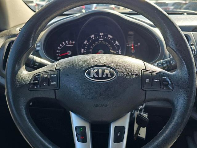 Photo of 2013 Signal Red Kia Sportage