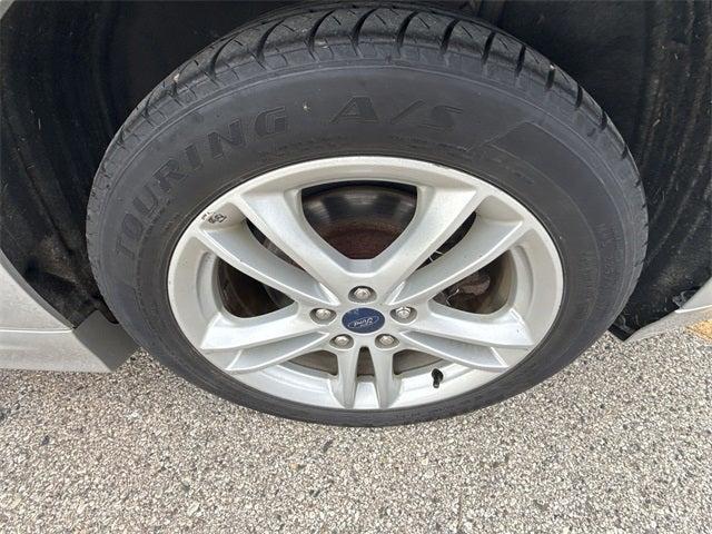 Photo of 2018 Ingot Silver Ford Fusion Hybrid