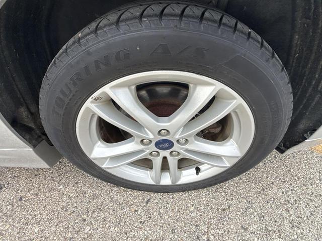 Photo of 2018 Ingot Silver Ford Fusion Hybrid