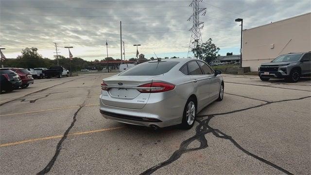 Photo of 2018 Ingot Silver Ford Fusion Hybrid