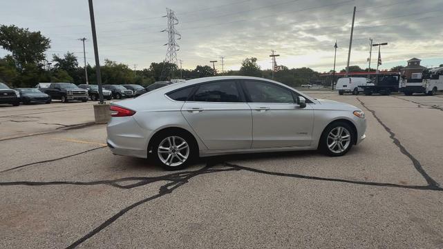 Photo of 2018 Ingot Silver Ford Fusion Hybrid