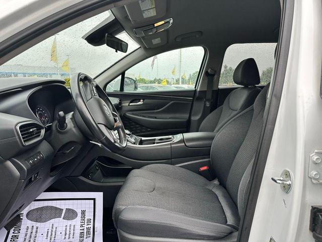 Photo of 2023 Serenity White Pearl Hyundai SANTA FE