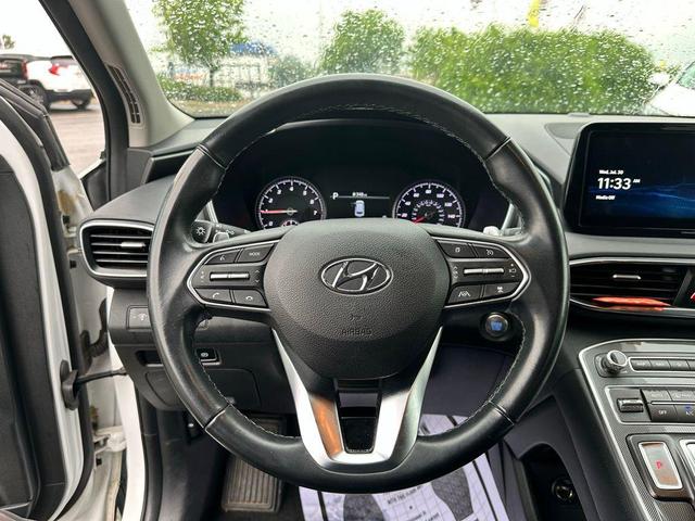 Photo of 2023 Serenity White Pearl Hyundai SANTA FE