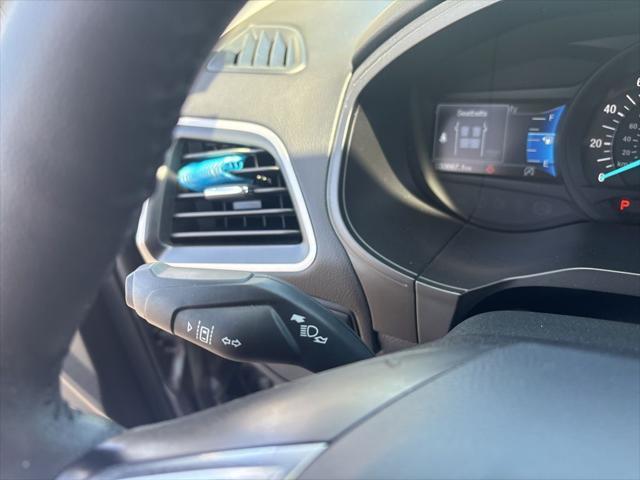 Photo of 2024 CARBONIZED GRAY Ford Edge