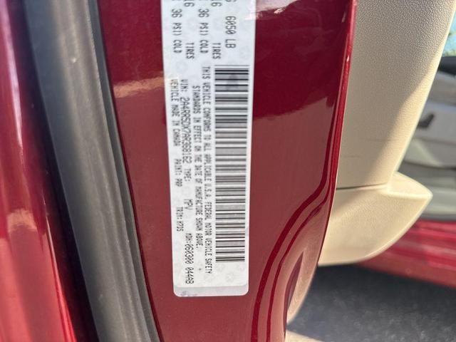 Photo of 2010 Deep Cherry Red Crystal Pearlcoat Chrysler Town & Country