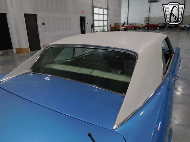 Photo of 1967 Blue and White Pontiac GTO