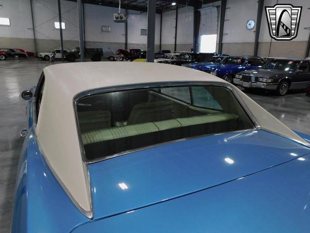 Photo of 1967 Blue and White Pontiac GTO