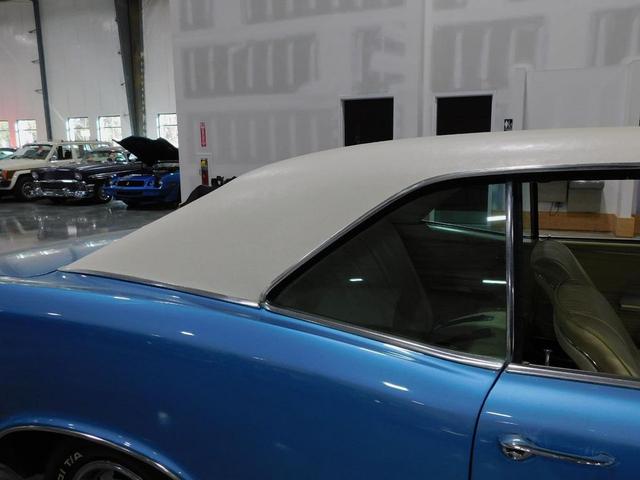 Photo of 1967 Blue and White Pontiac GTO