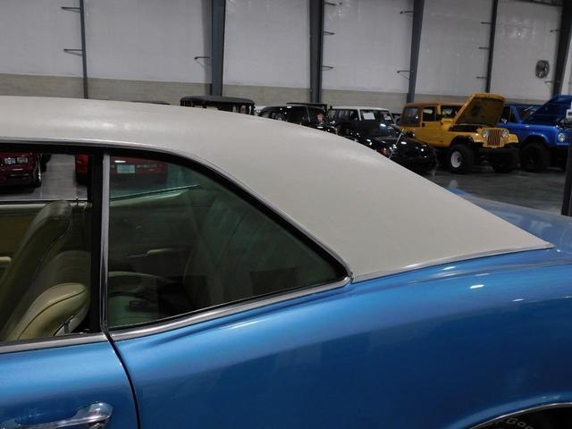 Photo of 1967 Blue and White Pontiac GTO