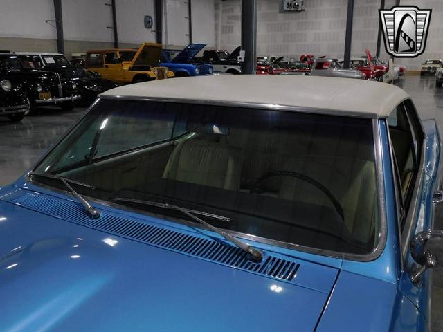 Photo of 1967 Blue and White Pontiac GTO